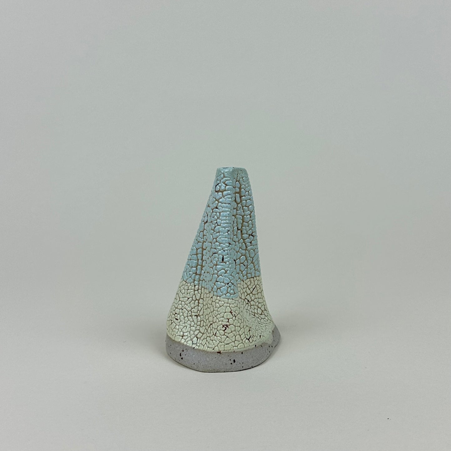 Stone, yellow and turquoise volcano vase (S) by Astrid Öhman