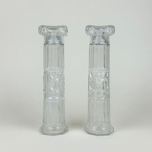 Glass bottles shaped like Roman pillars, pair