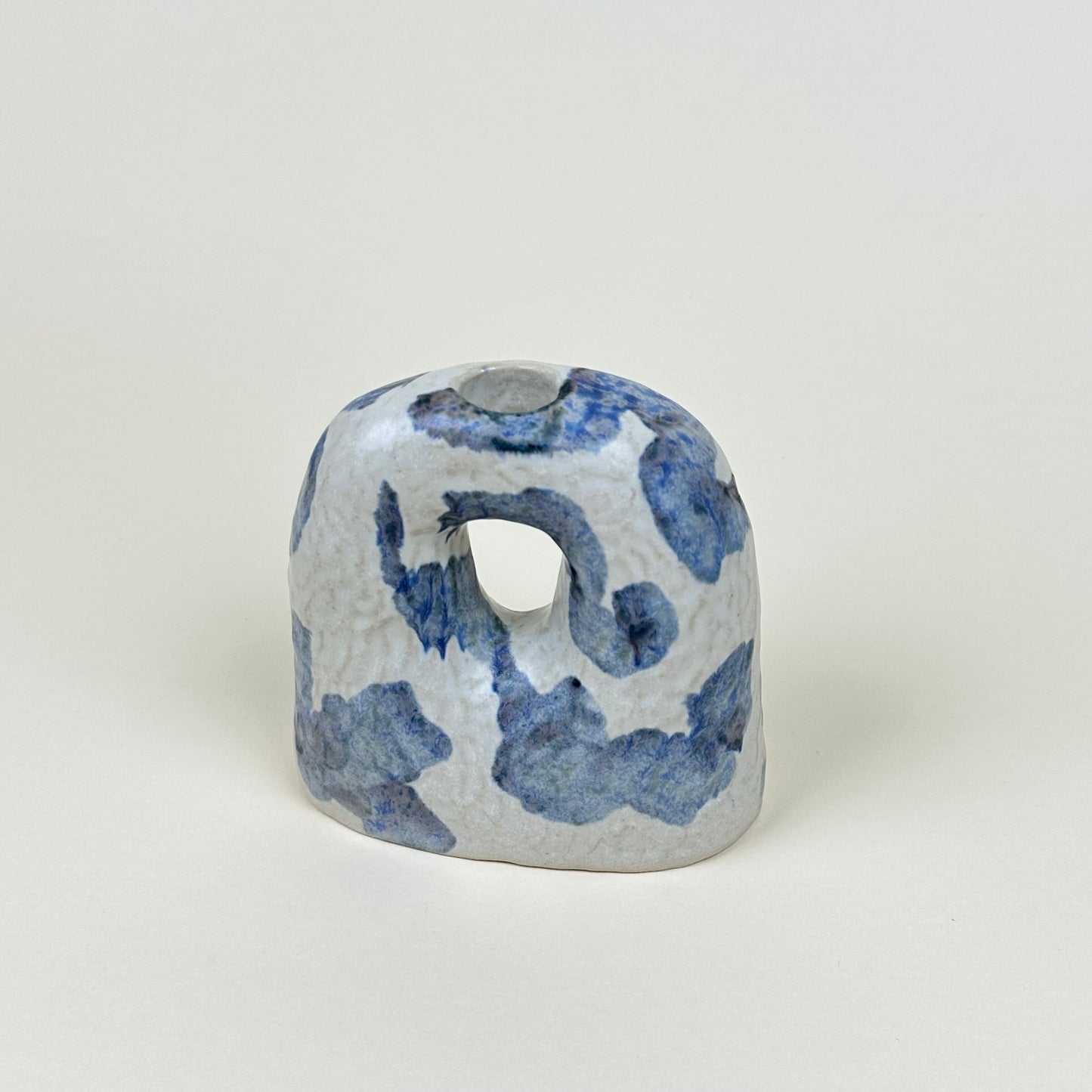 White and blue stoneware candle holder by Malwina Kleparska