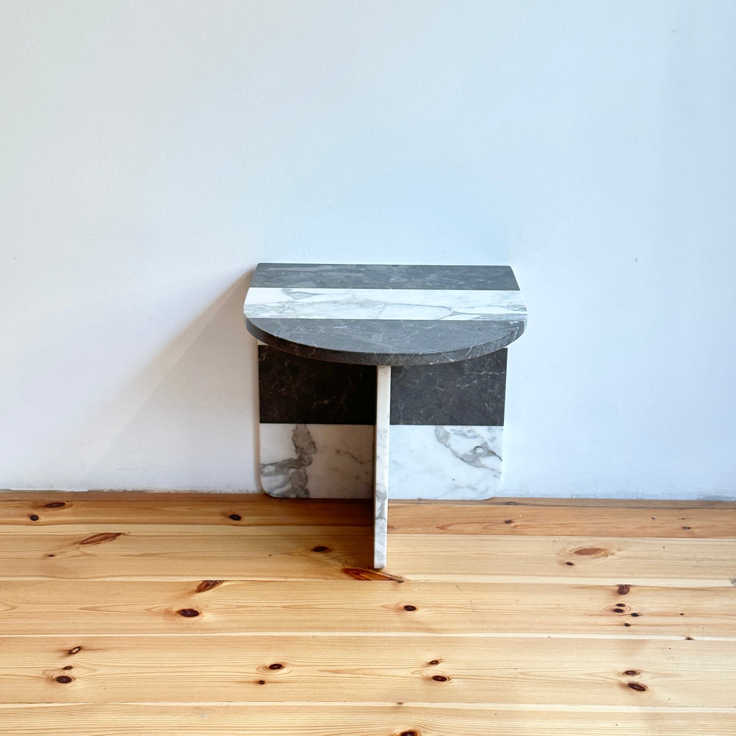 Striped marble sidetable by Public Studio