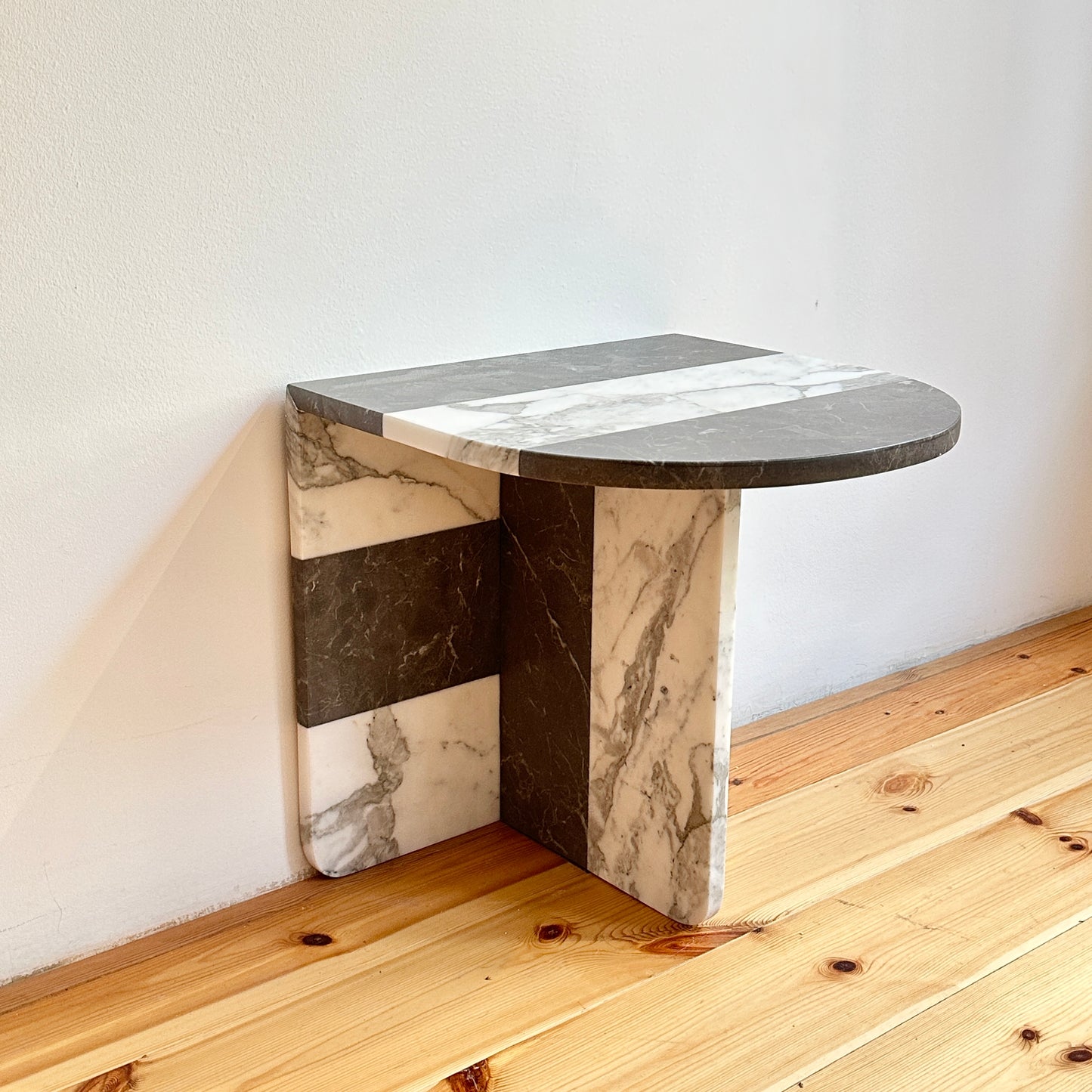 Striped marble sidetable by Public Studio