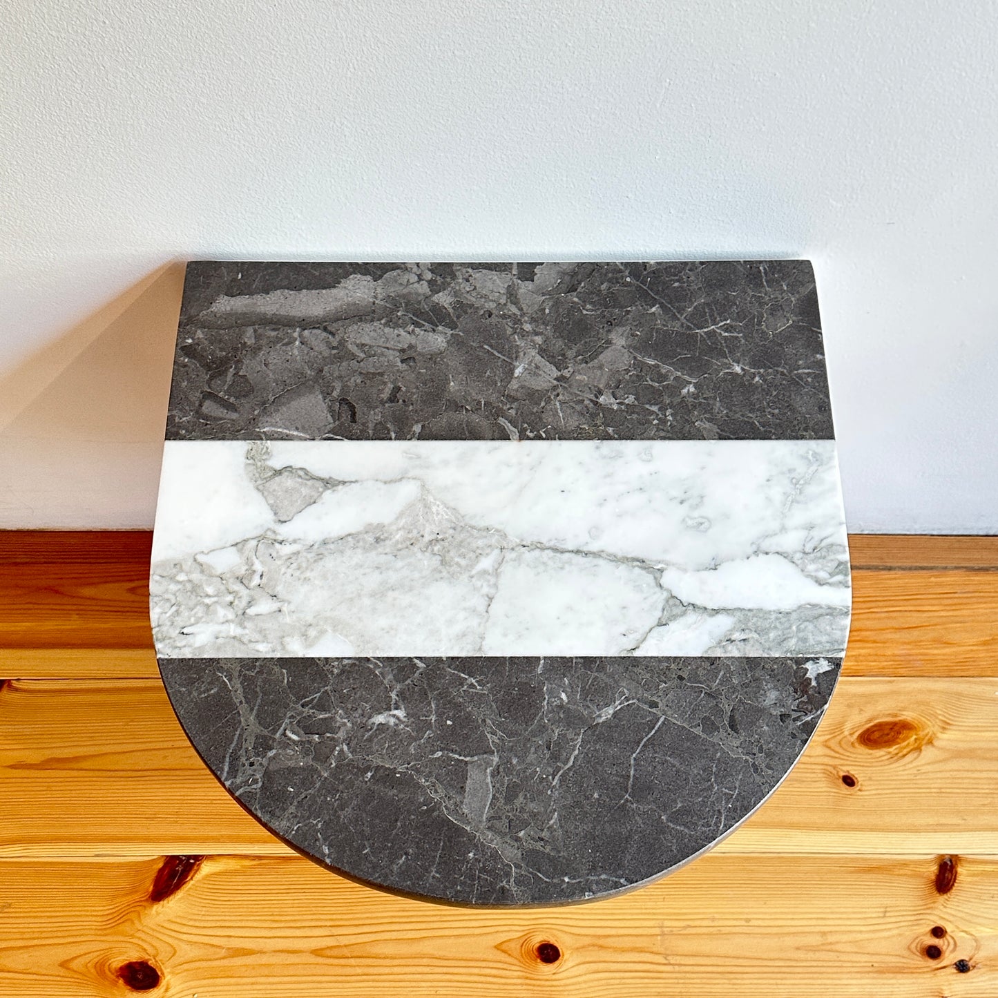 Striped marble sidetable by Public Studio