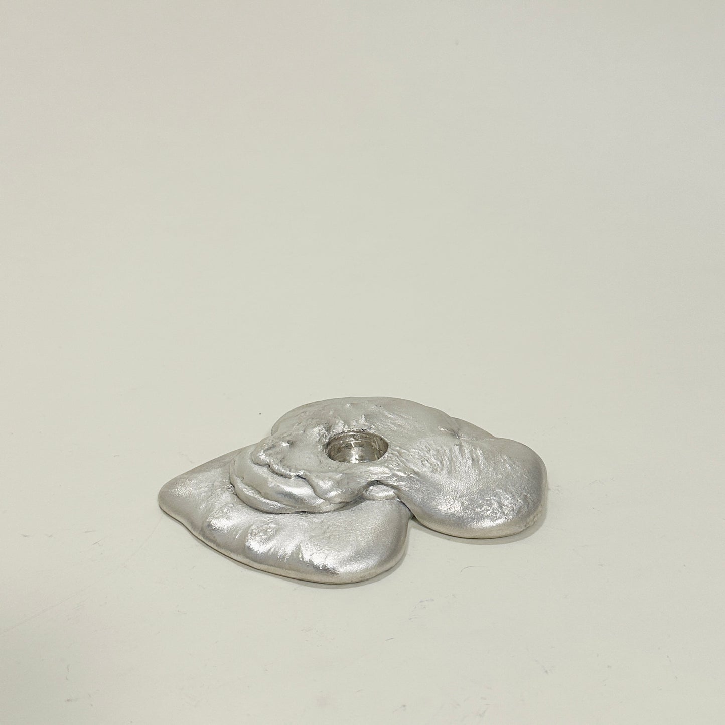 Tin candle holder by Alfred Sahlén