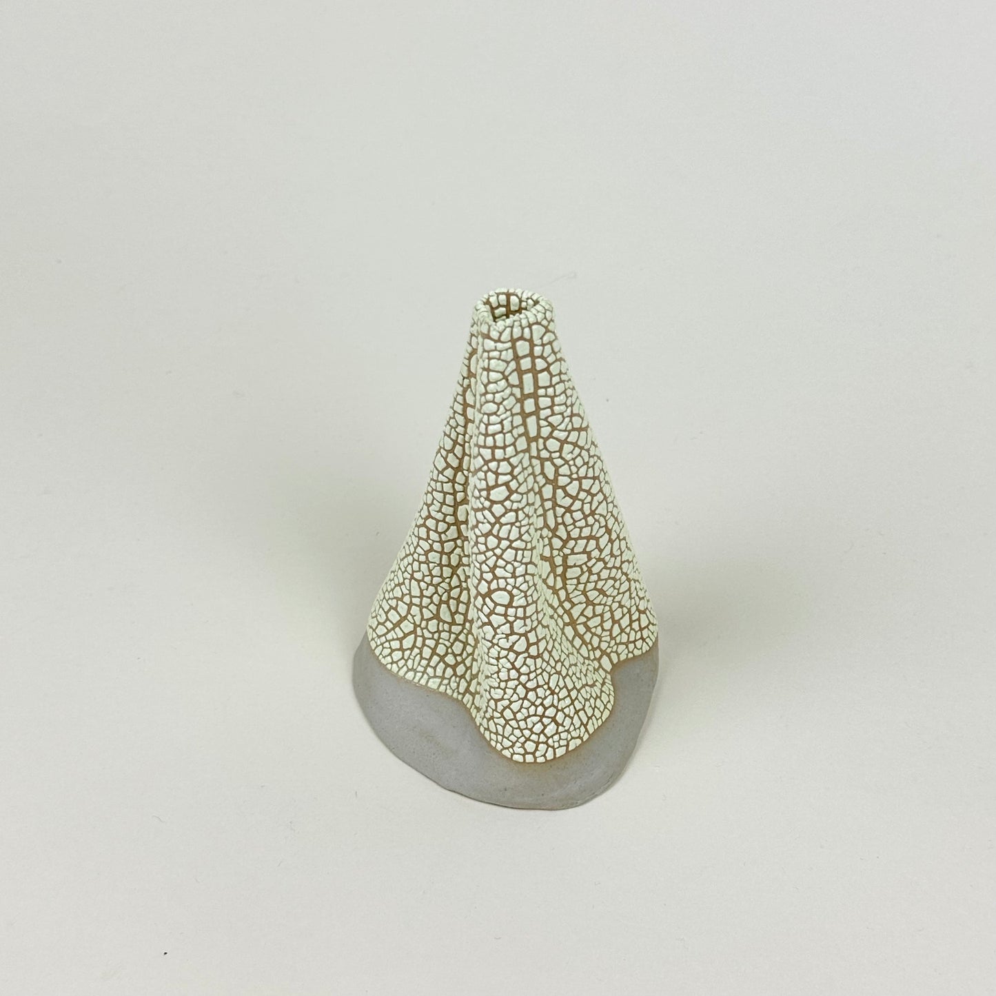 Stone and pale yellow volcano vase (L) by Astrid Öhman