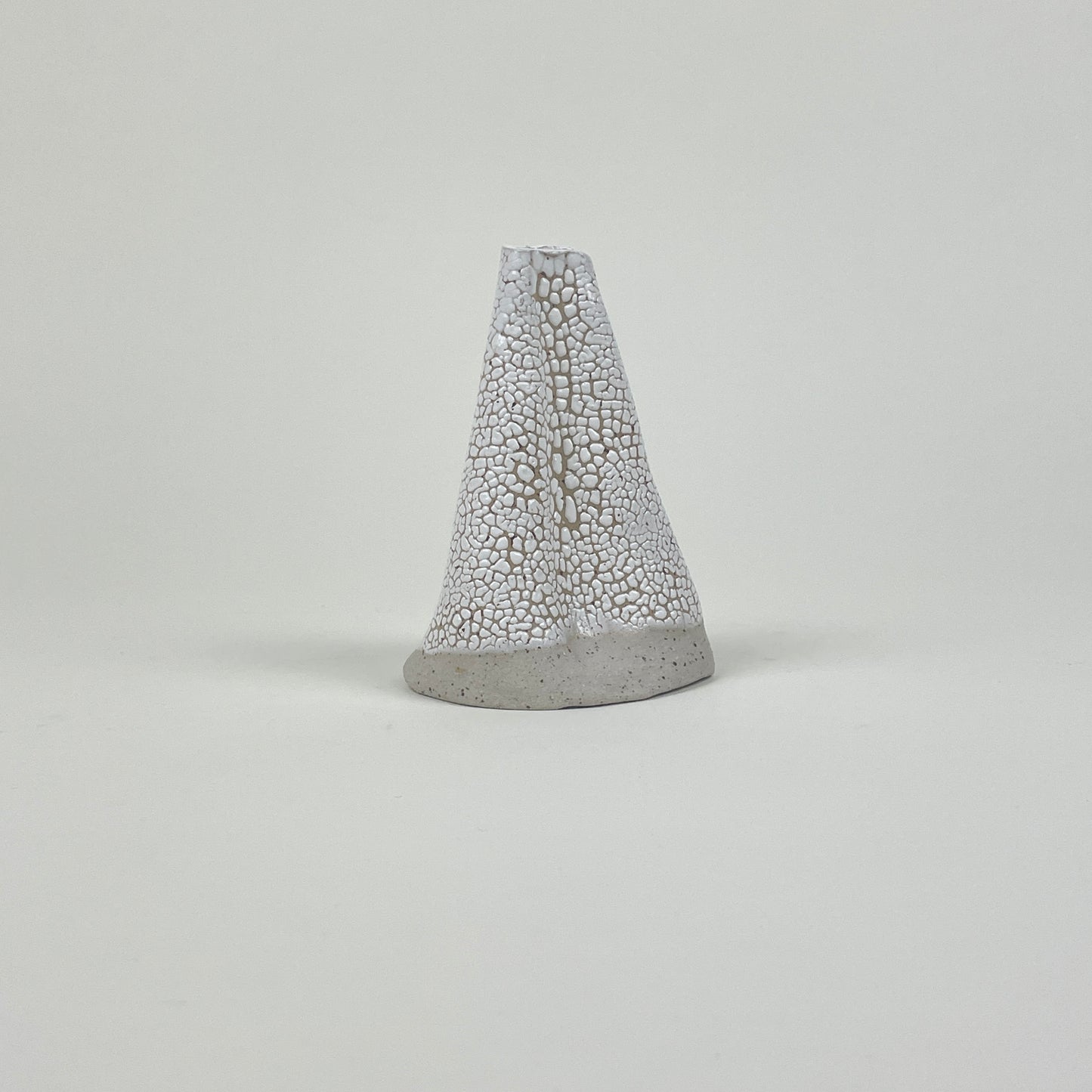 White stone volcano vase (L) by Astrid Öhman