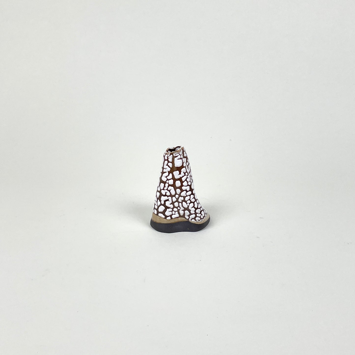 Brown white beige volcano vase (S) by Astrid Öhman.