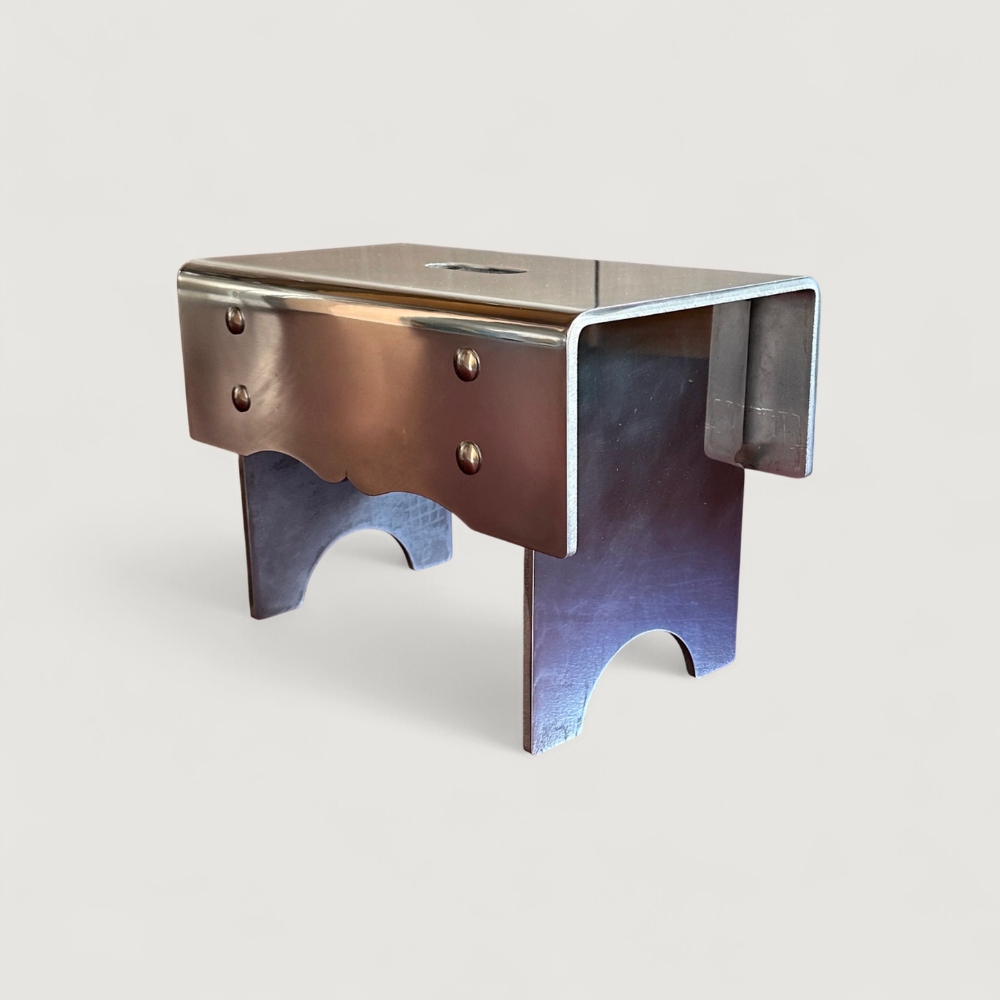 "Alumoge" milk stool in aluminum by Anna Levander