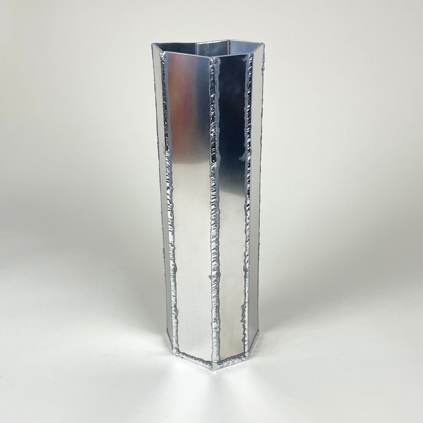 "AL13", welded aluminum vase by Julia Jutterström