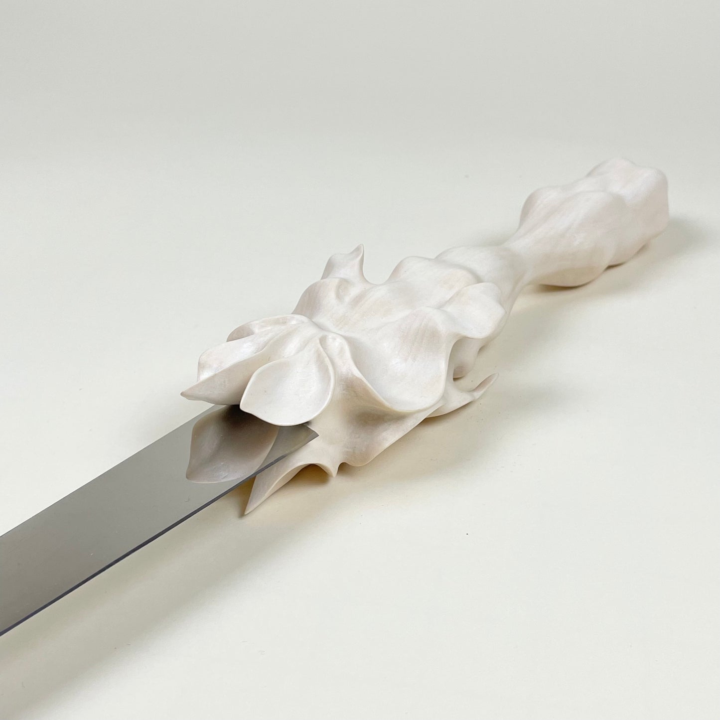 Flower with knife by Sofia Eriksson
