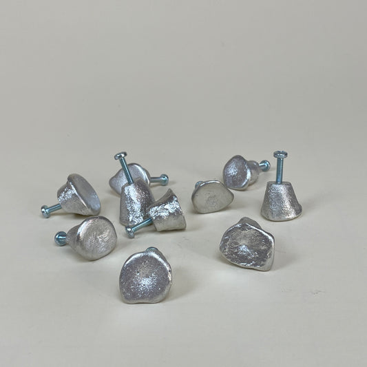 Tin door knob by Alfred Sahlén